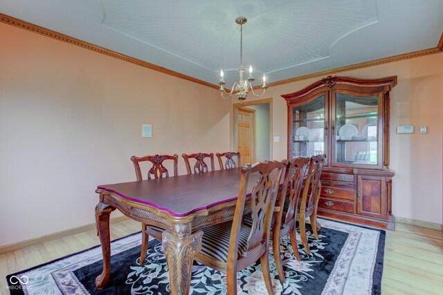 8371 N 400 W, Fairland, IN 46126 - dining space featuring a chandelier, light wood-type flooring, ornamental molding, and baseboards