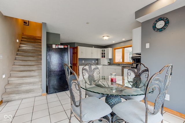 8371 N 400 W, Fairland, IN 46126 - dining area with stairway, light tile patterned floors, and baseboards