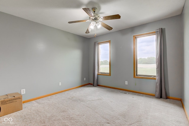 8371 N 400 W, Fairland, IN 46126 - spare room featuring light colored carpet, baseboards, and ceiling fan
