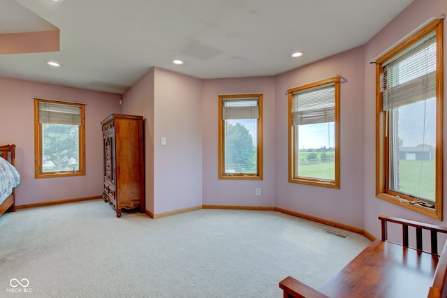 8371 N 400 W, Fairland, IN 46126 - unfurnished bedroom with light carpet, baseboards, and recessed lighting