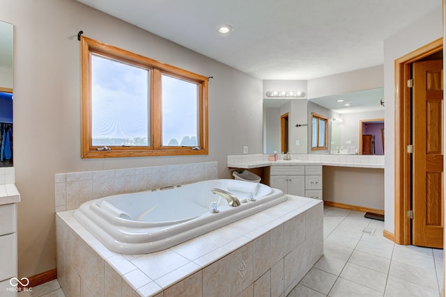 8371 N 400 W, Fairland, IN 46126 - bathroom featuring vanity, a garden tub, tile patterned flooring, baseboards, and recessed lighting