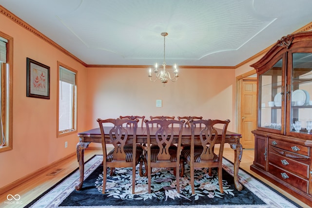 8371 N 400 W, Fairland, IN 46126 - dining space featuring light wood-style flooring, a chandelier, and crown molding