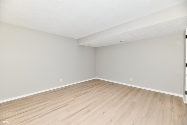 1053 Millwood Ct Unit 3, Indianapolis, IN 46260 - unfurnished room with light wood finished floors and baseboards