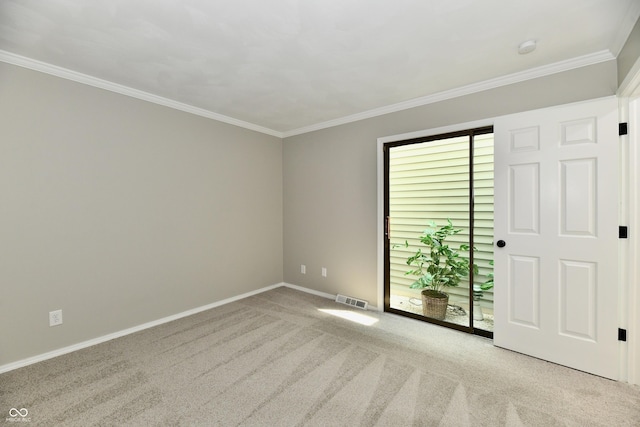 1053 Millwood Ct Unit 3, Indianapolis, IN 46260 - empty room featuring carpet flooring, baseboards, crown molding, and a smoke detector