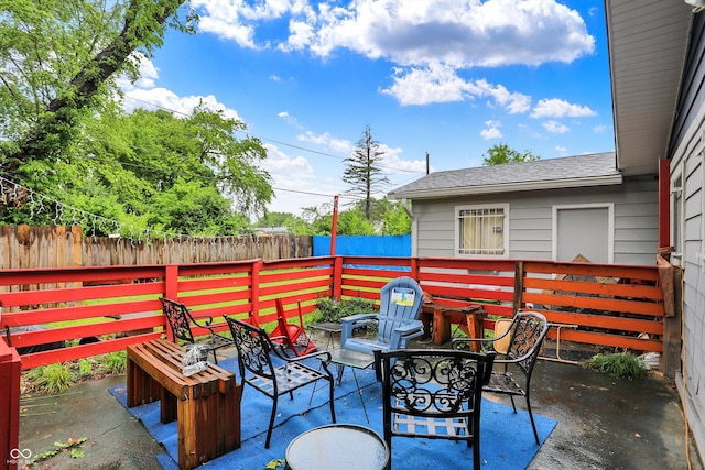 2832 Hillside Ave, Indianapolis, IN 46218 - fenced backyard with a patio area
