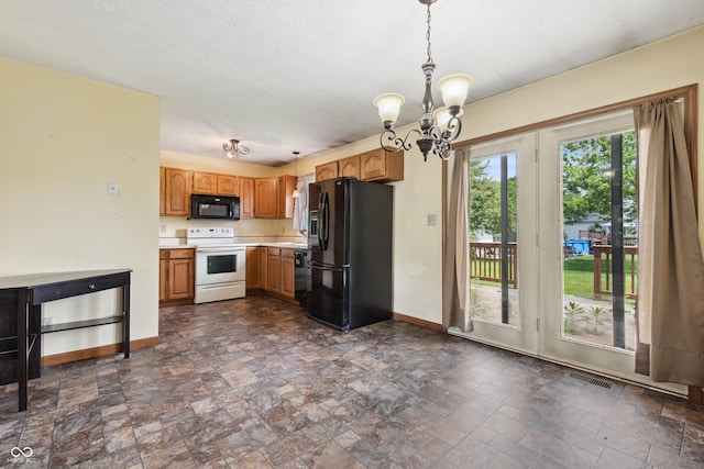 5380 Collett Dr E, Camby, IN 46113 - kitchen with black appliances, baseboards, dark stone finish flooring, a chandelier, and light countertops