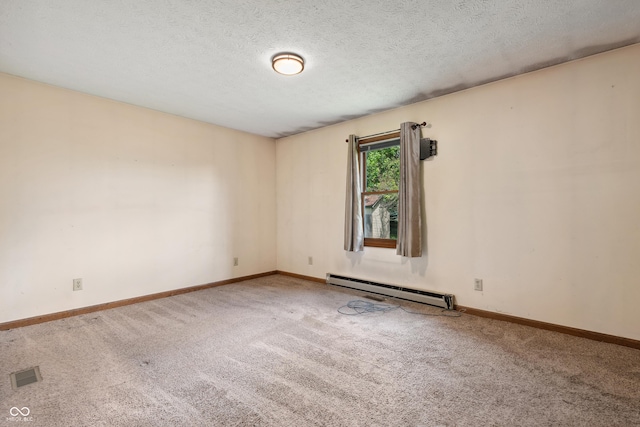 5380 Collett Dr E, Camby, IN 46113 - carpeted empty room featuring a baseboard heating unit, baseboards, and a textured ceiling