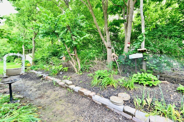 2805 Rylee Ct, Greenwood, IN 46143 - view of yard with a garden