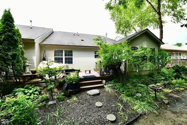 2805 Rylee Ct, Greenwood, IN 46143 - rear view of house with a deck and roof with shingles