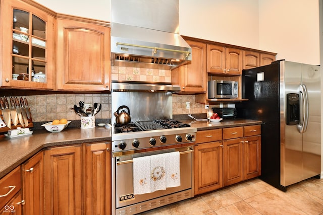 2805 Rylee Ct, Greenwood, IN 46143 - kitchen featuring stainless steel appliances, range hood, glass insert cabinets, dark countertops, and decorative backsplash