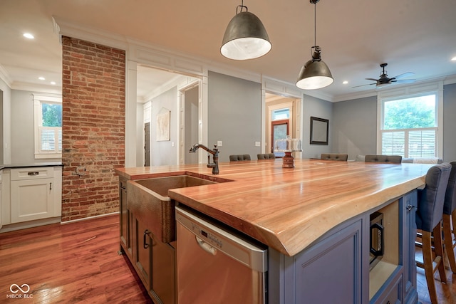 1512 Bellefontaine St, Indianapolis, IN 46202 - kitchen with dishwasher, wood counters, ornamental molding, a sink, and healthy amount of natural light