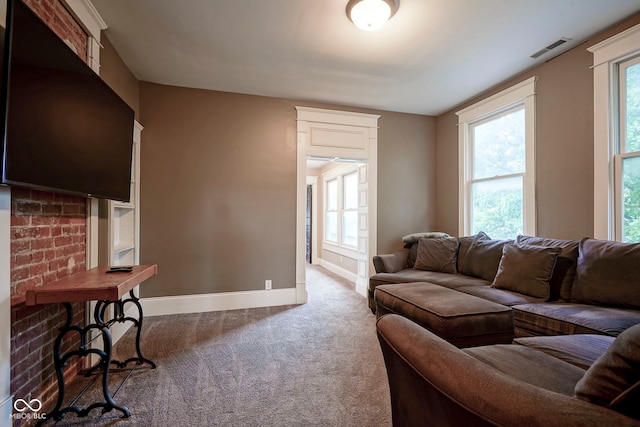 1512 Bellefontaine St, Indianapolis, IN 46202 - living area with carpet flooring, healthy amount of natural light, and baseboards