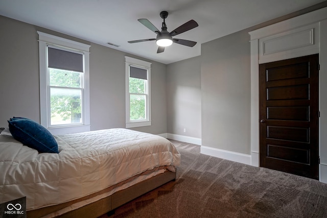 1512 Bellefontaine St, Indianapolis, IN 46202 - bedroom featuring carpet, baseboards, and ceiling fan
