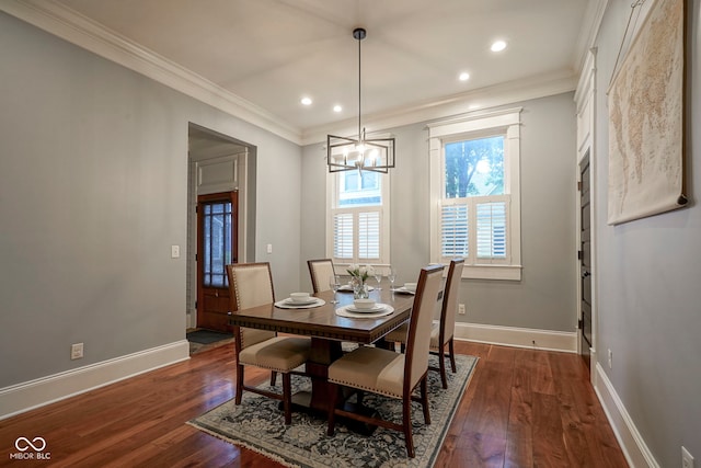 1512 Bellefontaine St, Indianapolis, IN 46202 - dining area featuring dark wood-type flooring, a chandelier, crown molding, recessed lighting, and baseboards