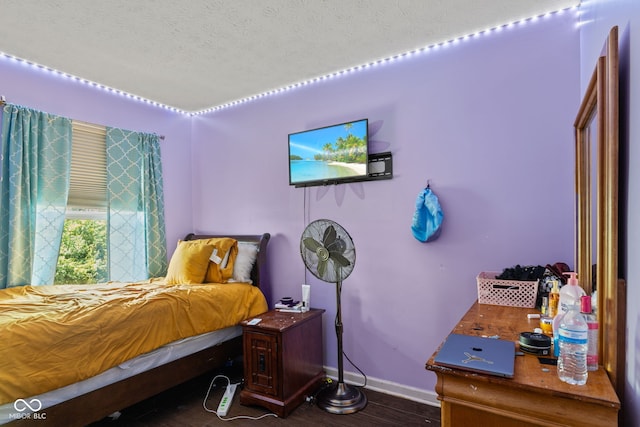 9125 Timpani Way, Indianapolis, IN 46231 - bedroom featuring a textured ceiling and wood finished floors