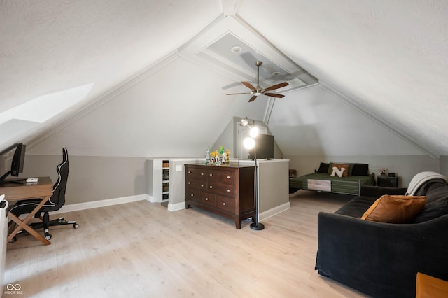22 N Bolton Ave, Indianapolis, IN 46219 - home office featuring light wood-style flooring, baseboards, a ceiling fan, a skylight, and vaulted ceiling