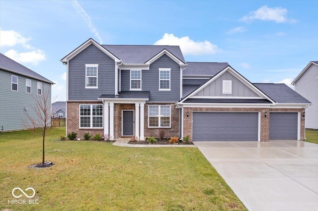 5655 Lighthouse Dr, Brownsburg, IN 46112 - view of front of home featuring brick siding, a garage, concrete driveway, a front yard, and board and batten siding