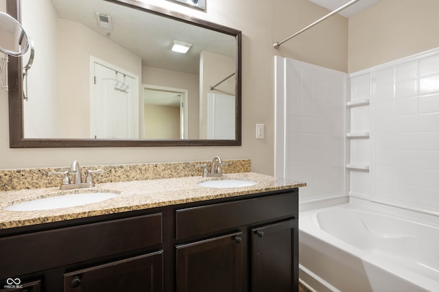 1412 Huntzinger Blvd, Pendleton, IN 46064 - full bathroom featuring double vanity and shower / washtub combination