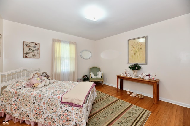 1910 Ivy Dr, Anderson, IN 46011 - bedroom with wood finished floors and baseboards