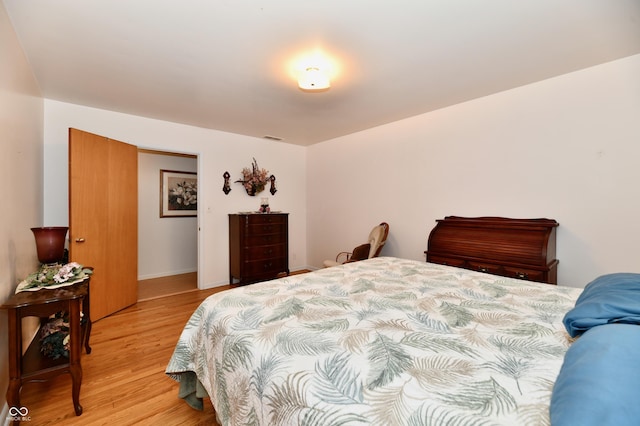 1910 Ivy Dr, Anderson, IN 46011 - bedroom with light wood-style floors and baseboards