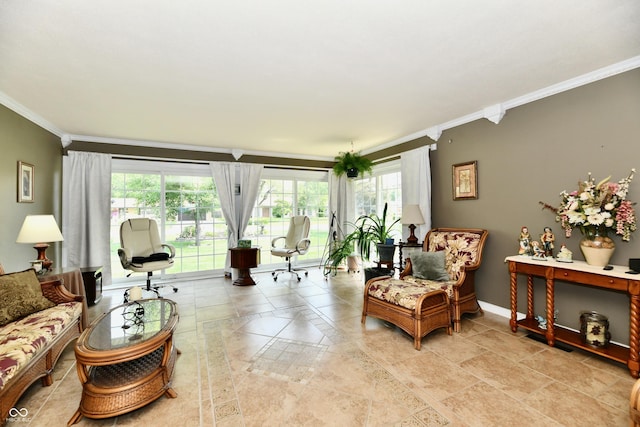 1910 Ivy Dr, Anderson, IN 46011 - living room featuring ornamental molding, healthy amount of natural light, and baseboards