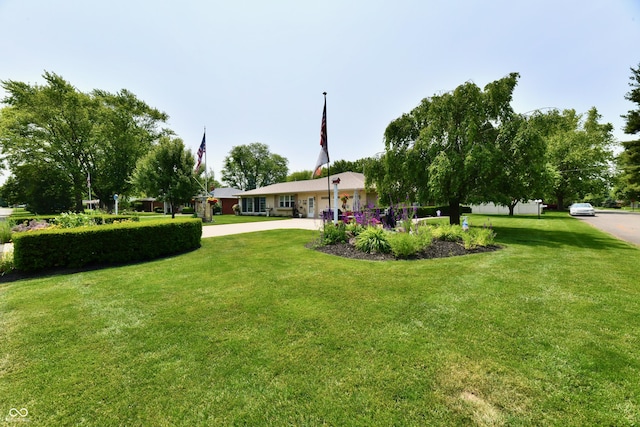 1910 Ivy Dr, Anderson, IN 46011 - view of green lawn with driveway