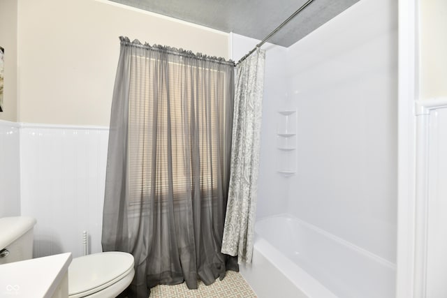 1910 Ivy Dr, Anderson, IN 46011 - full bath with toilet, vanity, shower / tub combo with curtain, and wainscoting