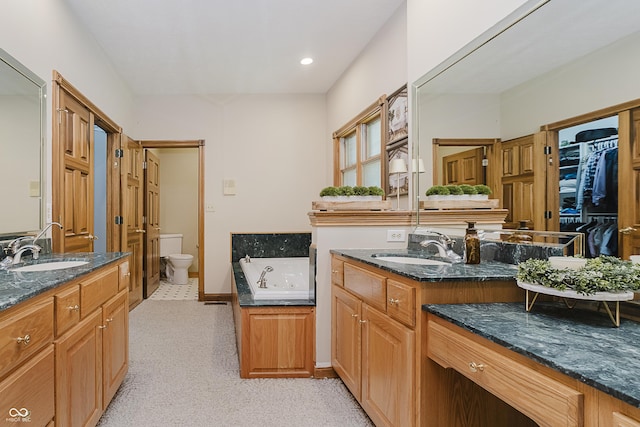 815 Copperfield Ln, Danville, IN 46122 - full bath with two vanities, a garden tub, and a closet