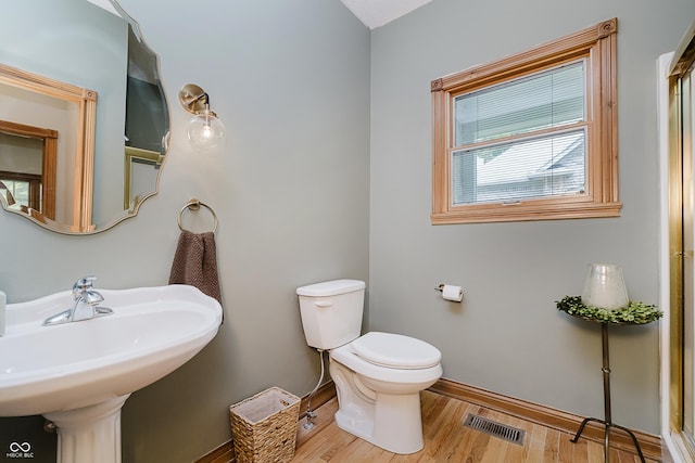 815 Copperfield Ln, Danville, IN 46122 - bathroom featuring toilet and wood finished floors