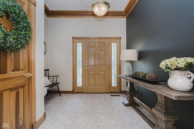 815 Copperfield Ln, Danville, IN 46122 - entryway with crown molding and light tile patterned floors