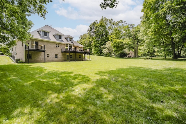 815 Copperfield Ln, Danville, IN 46122 - view of grassy yard featuring a deck