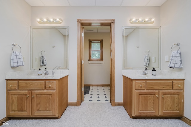 815 Copperfield Ln, Danville, IN 46122 - bathroom with two vanities and baseboards