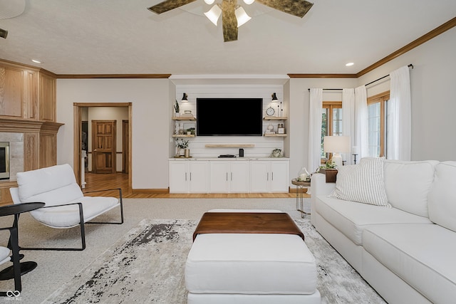 815 Copperfield Ln, Danville, IN 46122 - living area with crown molding, ceiling fan, and recessed lighting
