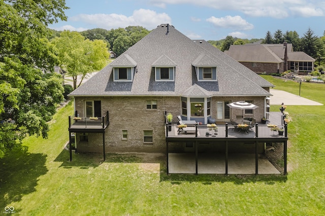 815 Copperfield Ln, Danville, IN 46122 - back of house with a wooden deck, a patio area, a yard, and roof with shingles