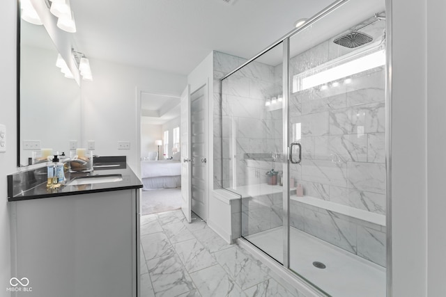 full bathroom featuring marble look tile flooring, ensuite bath, a marble finish shower, double vanity, and healthy amount of natural light