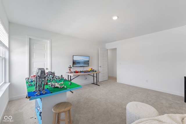 recreation room featuring carpet, baseboards, and recessed lighting