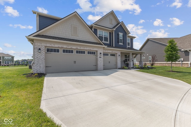 craftsman-style home featuring concrete driveway, a front lawn, brick siding, and a garage