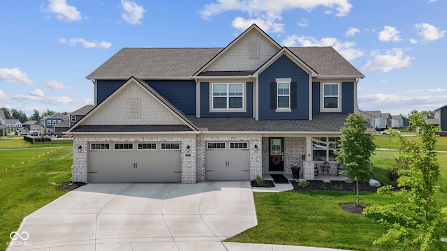 craftsman inspired home featuring concrete driveway, roof with shingles, a front lawn, and brick siding