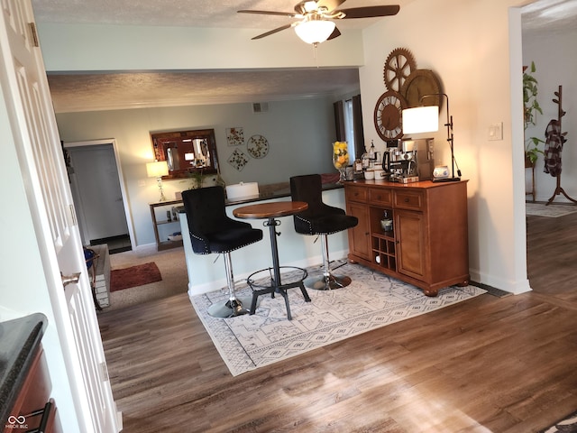 7870 E County Road 150 S, Avon, IN 46123 - dining space with ceiling fan, light wood finished floors, and ornamental molding