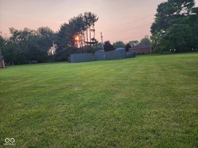 7870 E County Road 150 S, Avon, IN 46123 - yard at dusk featuring a lawn