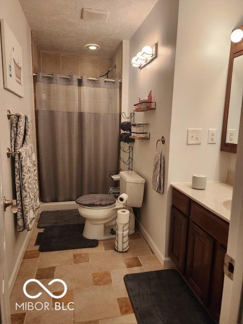 7870 E County Road 150 S, Avon, IN 46123 - bathroom with a textured ceiling, vanity, and a shower with shower curtain