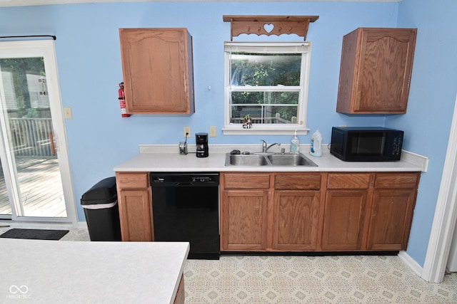 9237 Ogden Dunes Ct, Camby, IN 46113 - kitchen featuring black appliances and light countertops