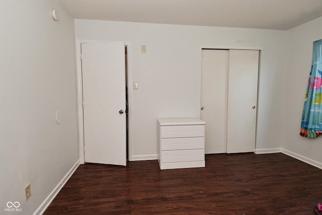 9237 Ogden Dunes Ct, Camby, IN 46113 - unfurnished bedroom with wood finished floors and a closet