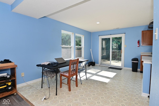 9237 Ogden Dunes Ct, Camby, IN 46113 - dining room featuring a desk and baseboards