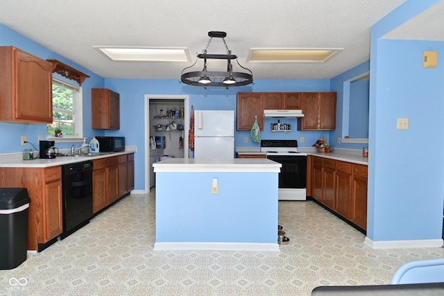 9237 Ogden Dunes Ct, Camby, IN 46113 - kitchen with black appliances, under cabinet range hood, light countertops, light floors, and a kitchen island