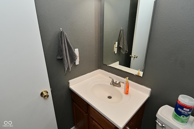 9237 Ogden Dunes Ct, Camby, IN 46113 - bathroom with vanity and a textured wall