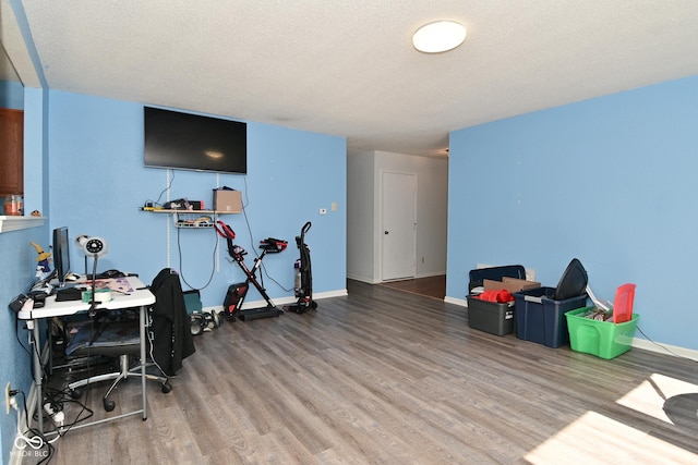 9237 Ogden Dunes Ct, Camby, IN 46113 - game room with wood finished floors and a textured ceiling