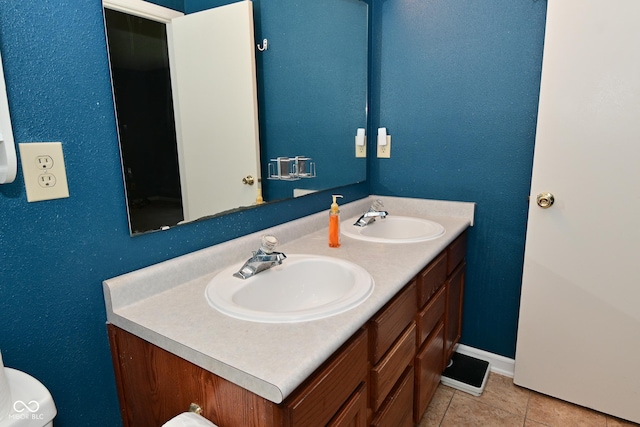 9237 Ogden Dunes Ct, Camby, IN 46113 - bathroom featuring double vanity and tile patterned floors
