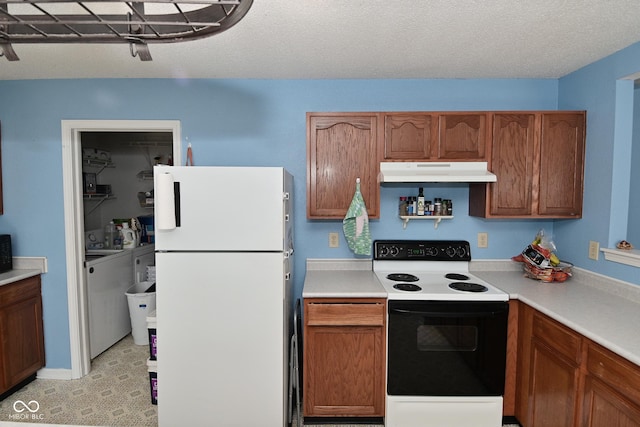 9237 Ogden Dunes Ct, Camby, IN 46113 - kitchen featuring electric stove, freestanding refrigerator, under cabinet range hood, and light countertops