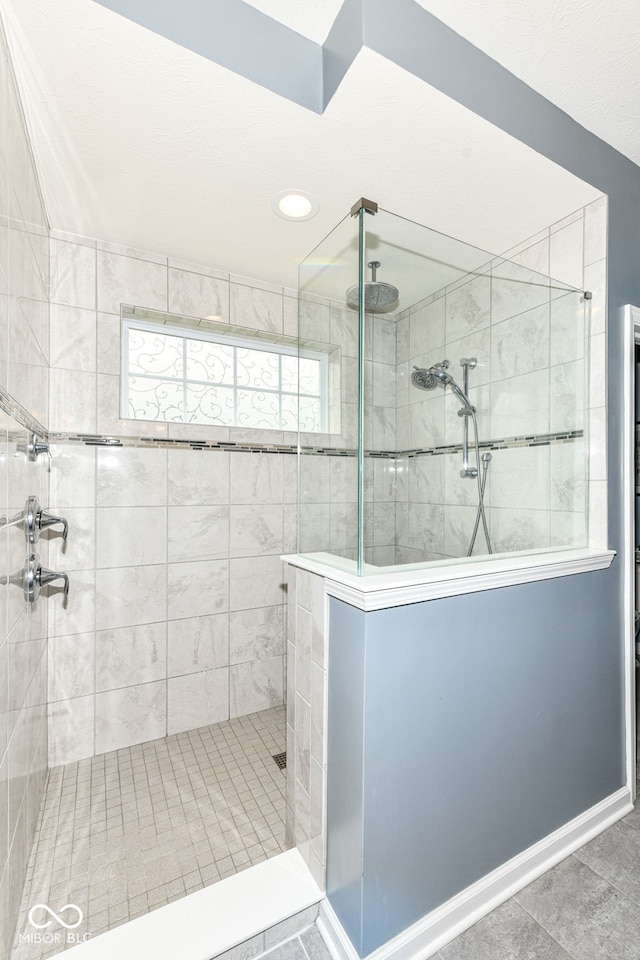 15097 Thoroughbred Dr, Fishers, IN 46040 - bathroom with a shower stall and tile patterned flooring